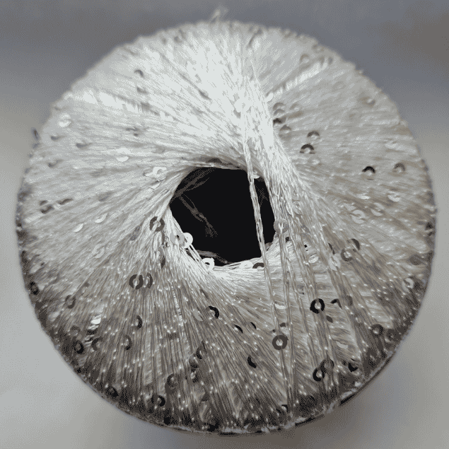 Kokvilnas dzija ar spīdumiem, fliteriem